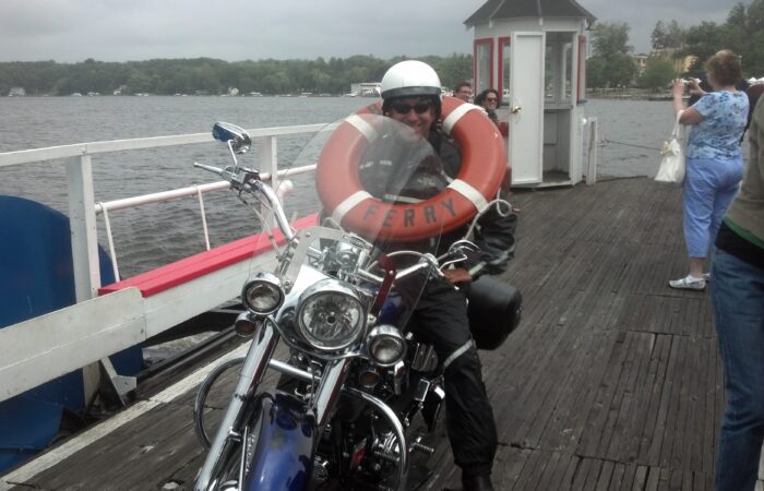 Marketing guy Chris Genovese sits on his 2005 Harley-Davidson Softail Deluxe while crossing Chautauqua Lake on the Bemus Point Ferry