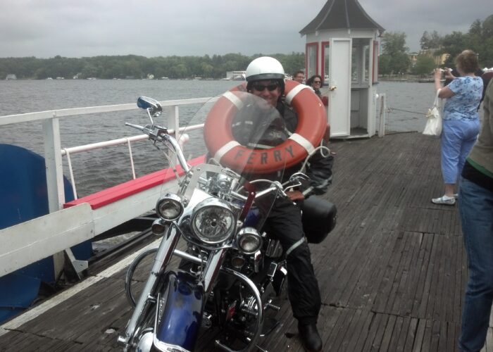 Marketing guy Chris Genovese sits on his 2005 Harley-Davidson Softail Deluxe while crossing Chautauqua Lake on the Bemus Point Ferry