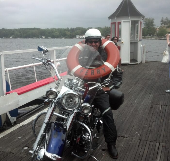 Marketing guy Chris Genovese sits on his 2005 Harley-Davidson Softail Deluxe while crossing Chautauqua Lake on the Bemus Point Ferry