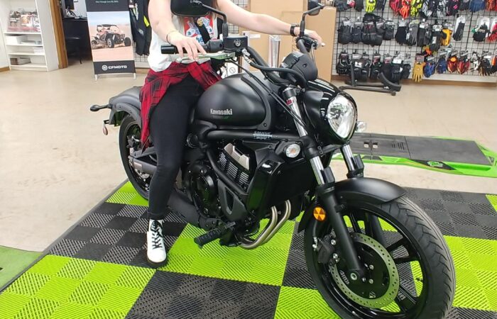 Attorney Christina Gullo sits on a 2023 Kawasaki Vulcan 650s at Hebeler's in Pendleton, NY