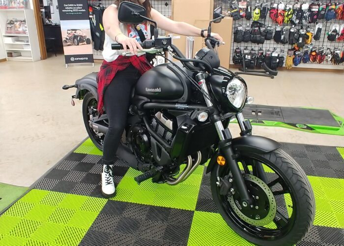 Attorney Christina Gullo sits on a 2023 Kawasaki Vulcan 650s at Hebeler's in Pendleton, NY