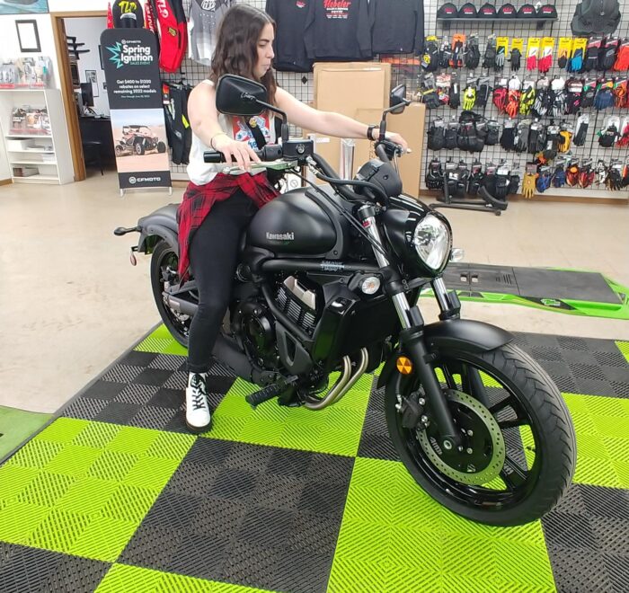 Attorney Christina Gullo sits on a 2023 Kawasaki Vulcan 650s at Hebeler's in Pendleton, NY