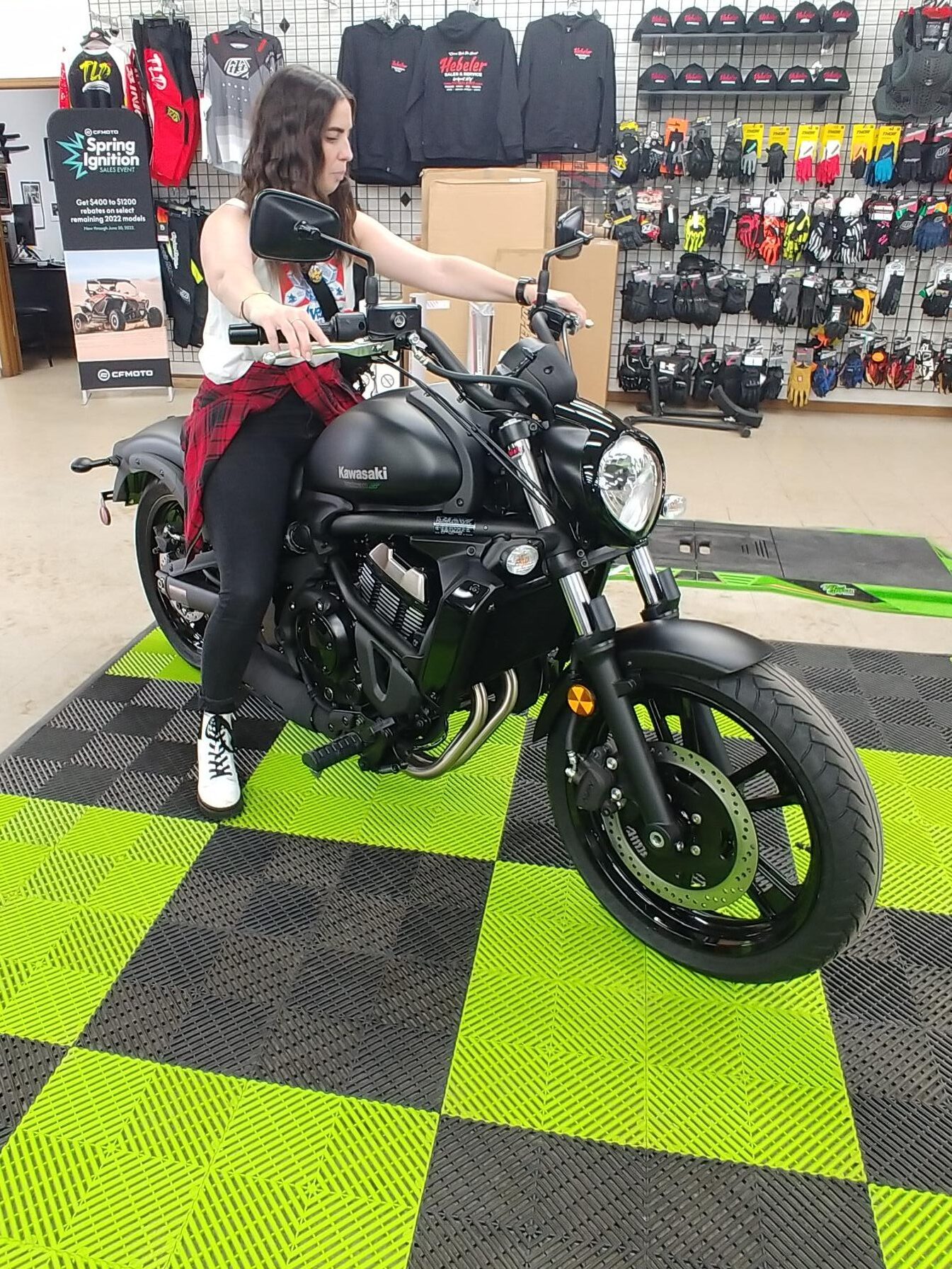 Attorney Christina Gullo sits on a Kawasaki Vulcan 650S at Hebeler's in Pendleton, NY