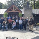 Group photo at the Log Cabin at Indian Falls from the 35th Annual ABATE of Buffalo/Erie Toy "Cash for Bikes" Run.