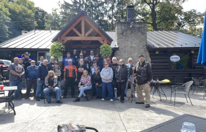 Group photo at the Log Cabin at Indian Falls from the 35th Annual ABATE of Buffalo/Erie Toy "Cash for Bikes" Run.