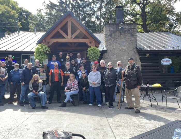 Group photo at the Log Cabin at Indian Falls from the 35th Annual ABATE of Buffalo/Erie Toy "Cash for Bikes" Run.