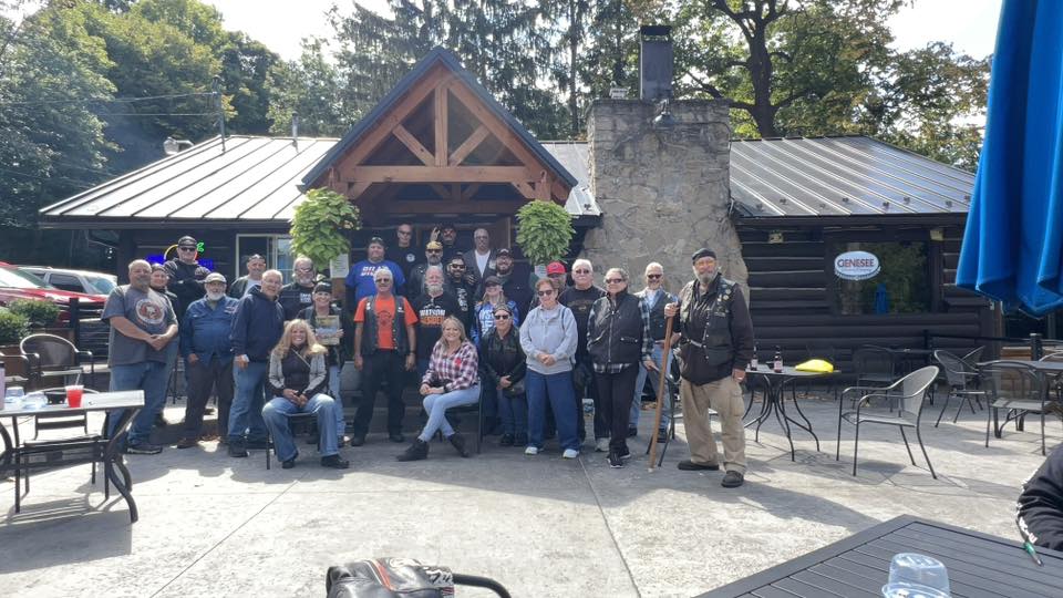Group photo at the Log Cabin at Indian Falls from the 35th Annual ABATE of Buffalo/Erie Toy "Cash for Bikes" Run.